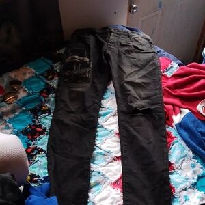 AMIRI Black Jeans with Branded Metal Logo